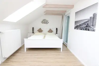 Ein Bett oder Betten in einem Zimmer der Unterkunft Haus Badezeit