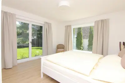 Ein Bett oder Betten in einem Zimmer der Unterkunft Haus Badezeit