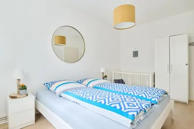 Ein Bett oder Betten in einem Zimmer der Unterkunft House family idyll Moba-travel