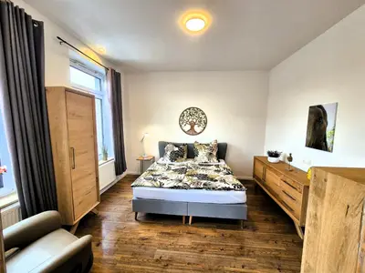 Ein Bett oder Betten in einem Zimmer der Unterkunft #LübEck