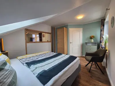 Ein Bett oder Betten in einem Zimmer der Unterkunft # Ausblick LübEck