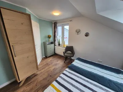 Ein Bett oder Betten in einem Zimmer der Unterkunft # Ausblick LübEck
