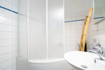 Ein Badezimmer in der Unterkunft Ferienhaus Seeweg Wohnung 1