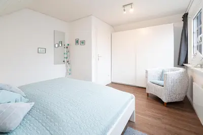 Ein Bett oder Betten in einem Zimmer der Unterkunft Ferienhaus Seeweg Wohnung 2