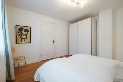 Ein Bett oder Betten in einem Zimmer der Unterkunft Das Ostseehus