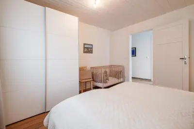 Ein Bett oder Betten in einem Zimmer der Unterkunft Das Ostseehus