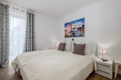 Ein Bett oder Betten in einem Zimmer der Unterkunft Strandperle #02