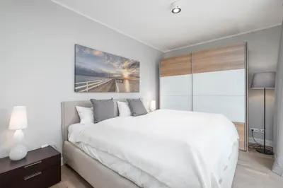 Ein Bett oder Betten in einem Zimmer der Unterkunft Wohnen am Meer App 18