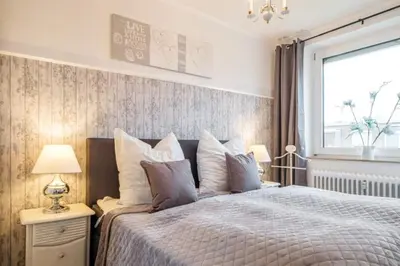 Ein Bett oder Betten in einem Zimmer der Unterkunft Strandrose