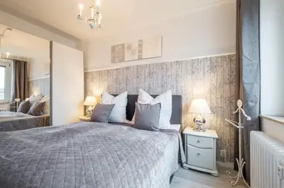 Ein Bett oder Betten in einem Zimmer der Unterkunft Strandrose