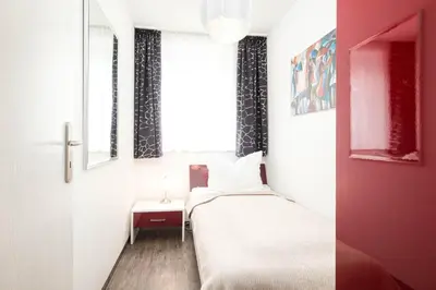 Ein Bett oder Betten in einem Zimmer der Unterkunft Domizil am Strand, App 7