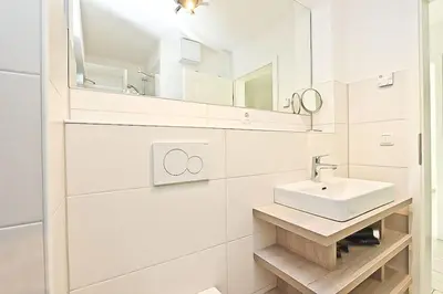 Ein Badezimmer in der Unterkunft Strandzeit #6