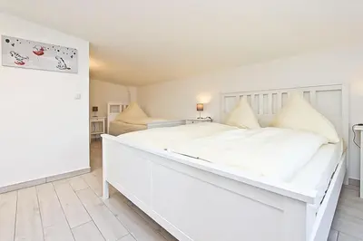 Ein Bett oder Betten in einem Zimmer der Unterkunft Strandzeit #6