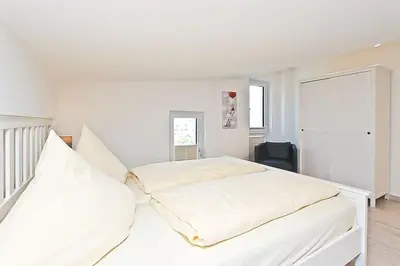 Ein Bett oder Betten in einem Zimmer der Unterkunft Strandzeit #6