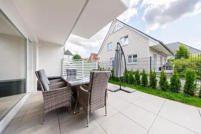Ein Garten an der Unterkunft SunSide Apartment #3