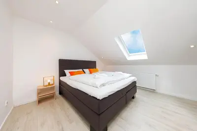 Ein Bett oder Betten in einem Zimmer der Unterkunft SunSide Apartment #3
