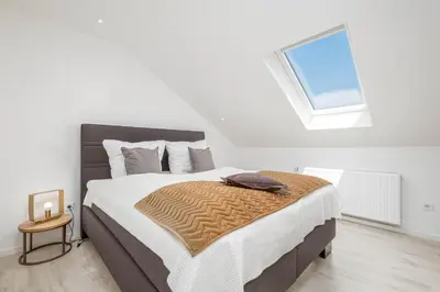 Ein Bett oder Betten in einem Zimmer der Unterkunft SunSide Apartment #5