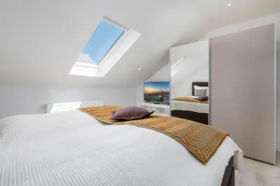 Ein Bett oder Betten in einem Zimmer der Unterkunft SunSide Apartment #5