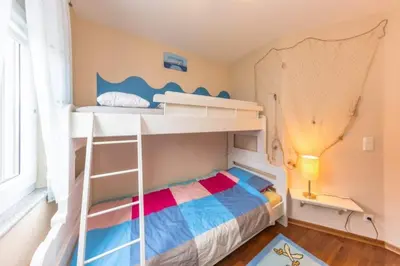 Ein Bett oder Betten in einem Zimmer der Unterkunft Trauminsel