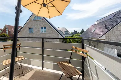 Ein Balkon oder eine Terrasse in der Unterkunft SunSide Apartment #4