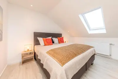 Ein Bett oder Betten in einem Zimmer der Unterkunft SunSide Apartment #4