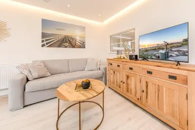 Ein Sitzbereich in der Unterkunft SunSide Apartment #4