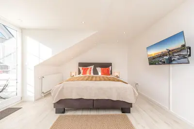 Ein Bett oder Betten in einem Zimmer der Unterkunft SunSide Apartment #4