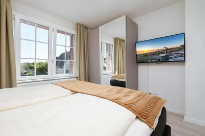 Ein Bett oder Betten in einem Zimmer der Unterkunft SunSide Apartment #2