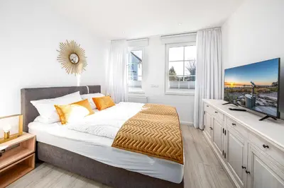 Ein Bett oder Betten in einem Zimmer der Unterkunft SunSide Apartment #1