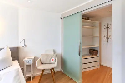 Ein Bett oder Betten in einem Zimmer der Unterkunft Sea View Suite