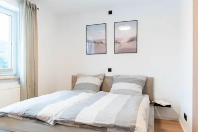 Ein Bett oder Betten in einem Zimmer der Unterkunft Ferienwohnung Wohnung 19 - Scharbeutz