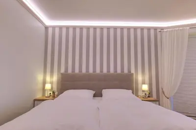 Ein Bett oder Betten in einem Zimmer der Unterkunft Ferienwohnung Samsö - frisch renoviert mit besonderem Ambiente