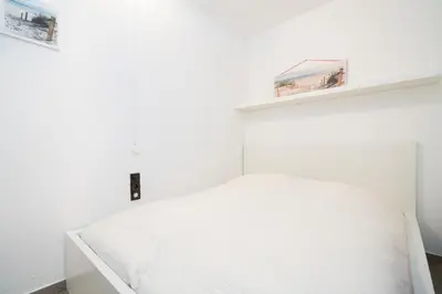 Ein Bett oder Betten in einem Zimmer der Unterkunft Ferienpark Sierksdorf Appartement 129
