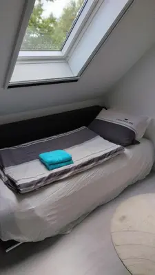 Ein Bett oder Betten in einem Zimmer der Unterkunft Helle voll ausgestattete 2 Zi Whg im Grünen