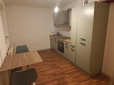 Küche/Küchenzeile in der Unterkunft Cozy apartment, central & child-friendly