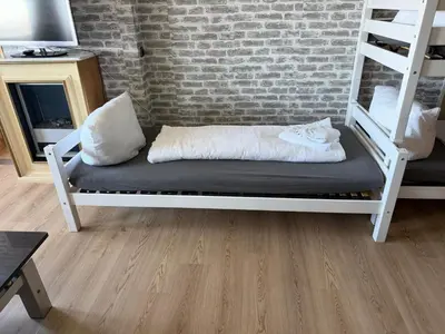Ein Bett oder Betten in einem Zimmer der Unterkunft K357 - Panoramic-Ferienwohnung mit seitlichem Ostseeblick in Sierksdorf