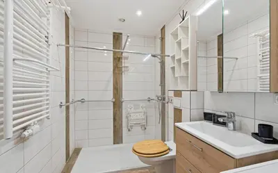 Ein Badezimmer in der Unterkunft K357 - Panoramic-Ferienwohnung mit seitlichem Ostseeblick in Sierksdorf