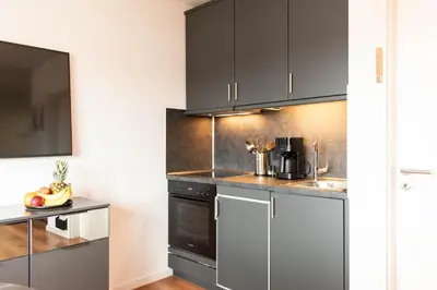 Küche/Küchenzeile in der Unterkunft Ferienwohnung Schlummerdüne Haffkrug