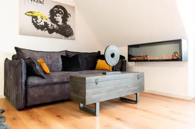 Ein Sitzbereich in der Unterkunft Ferienwohnung Schlummerdüne Haffkrug