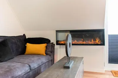 Ein Sitzbereich in der Unterkunft Ferienwohnung Schlummerdüne Haffkrug