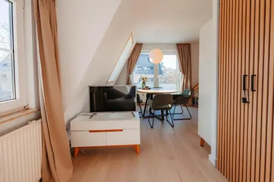 Ein Bett oder Betten in einem Zimmer der Unterkunft Ferienwohnung Wirbelwind