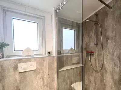 Ein Badezimmer in der Unterkunft Ostseecamp Ferienhaus 