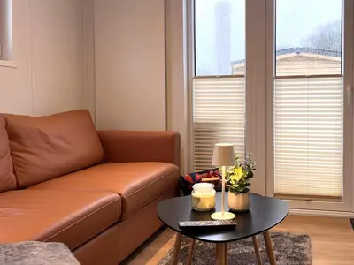 Ein Sitzbereich in der Unterkunft Ostseecamp Ferienhaus 