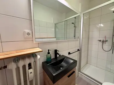 Ein Badezimmer in der Unterkunft Kajüte 15 - Ferienwohnung in Scharbeutz Ostsee - vordere Strandlage