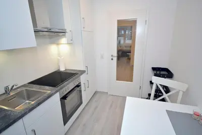 Küche/Küchenzeile in der Unterkunft myOSTSEE Sailing Ferienwohnung