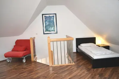 Ein Bett oder Betten in einem Zimmer der Unterkunft Ostseeallee 18 Ferienwohnung Muschelsucher