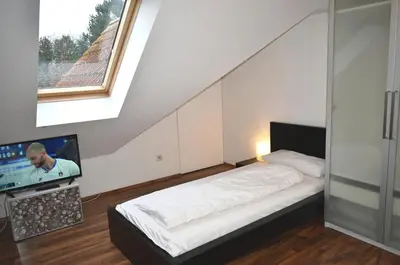 Ein Bett oder Betten in einem Zimmer der Unterkunft Ostseeallee 18 Ferienwohnung Muschelsucher