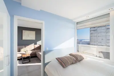 Ein Bett oder Betten in einem Zimmer der Unterkunft Panoramic App B07-1