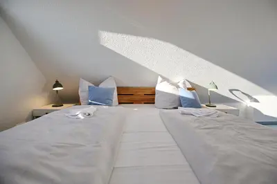 Ein Bett oder Betten in einem Zimmer der Unterkunft Hansa-Residenz I Appartement 18 Baltic Bright