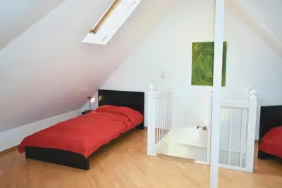 Ein Bett oder Betten in einem Zimmer der Unterkunft Ostseeallee 6 Ferienwohnung Treibholz